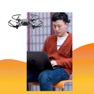 A graduate student flys a drone with a mind control helmet