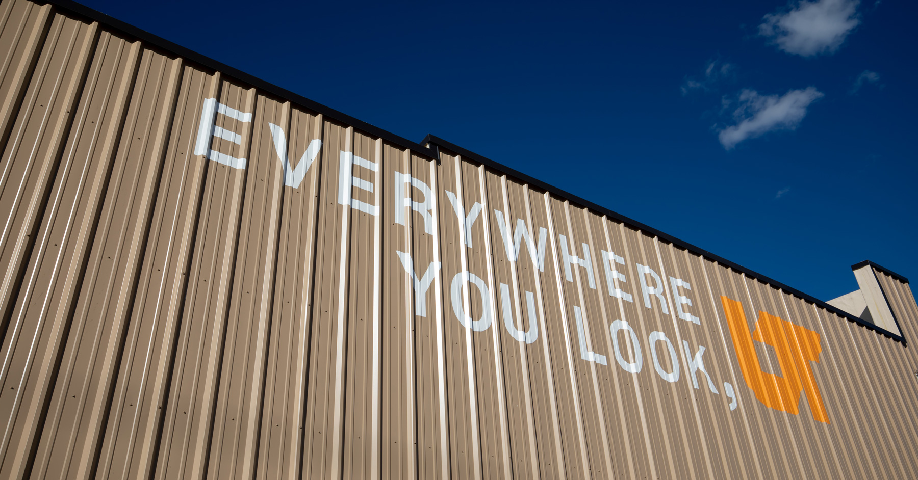 Everwhere You Look UT painted on an exterior aluminum wall