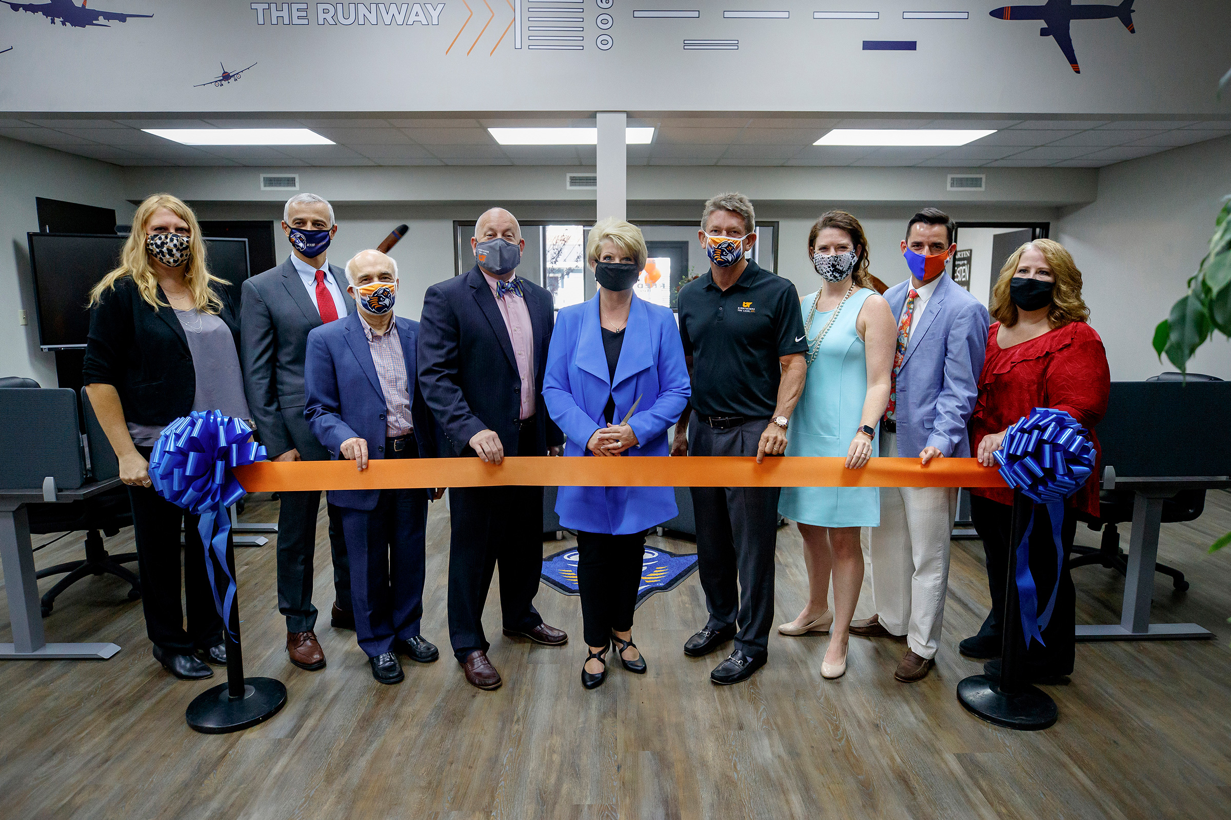 Keith Carver, Landy Fuqua, Randy Boyd and others cut the ribbon on the new coworking space at the REED center in Martin