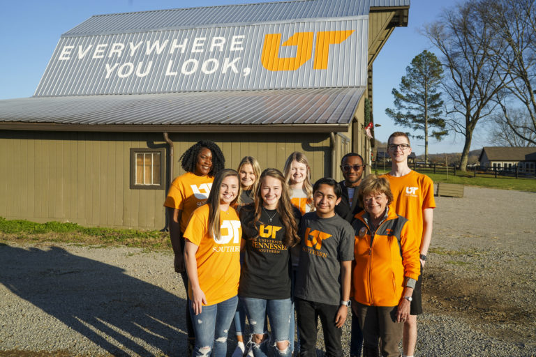 UT Southern students pose in front of the Everywhere you look, UT Mural in Giles County at Speerit Hill Farm, owned by alumna Brenda Speer.