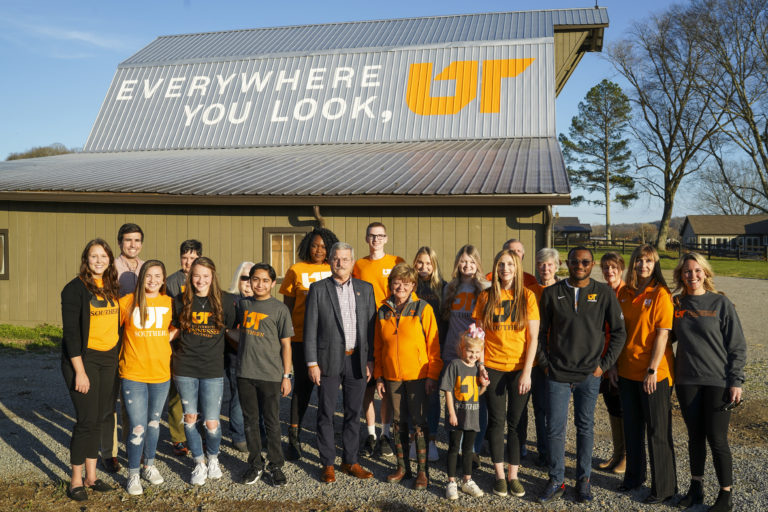 UT Southern Chancellor Mark La Branche with owner Brenda Speer and students and alumni