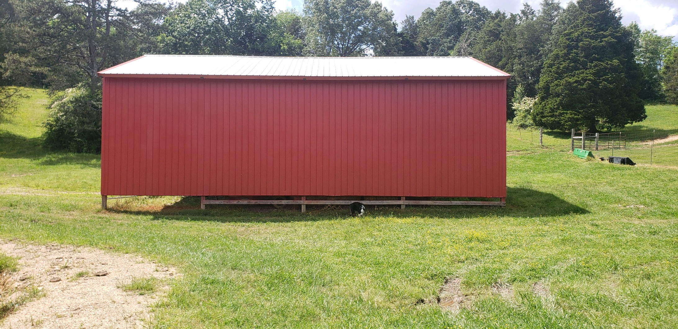 Red metal barn on L&C Cattle Company in Rhea County
